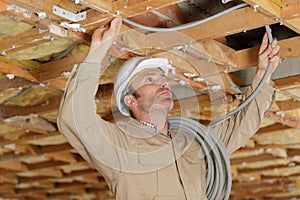 Man working with wood structure