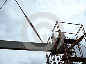 Man Working on the Working at height on construction
