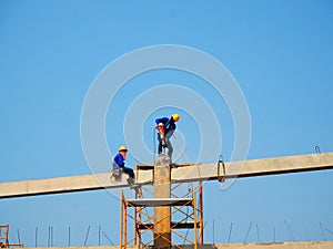 Man Working on the Working at height on construction