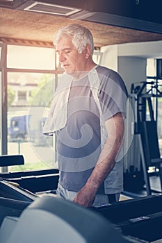 Man workout in gym. Man working exercise on treadmill. Wo