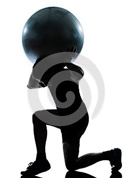 Man workout holding fitness ball