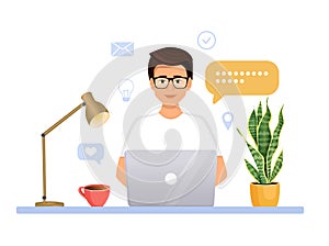 The man works at the computer. Remote work, freelance, home office, programming, education. Communication on the