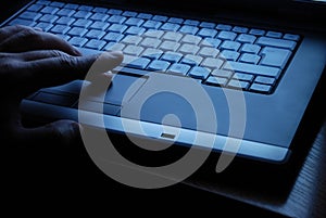 Man works on a laptop