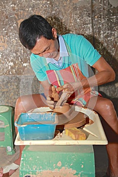 Man works on pottery wheel,Taibei,Taiwan.