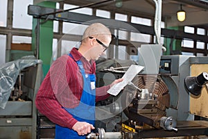 Man works for Production Machine