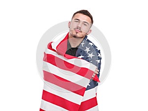 Man wrapped in an American flag isolated on a white background