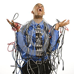 Man wrapped in cables.