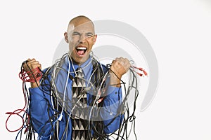 Man wrapped in cables.