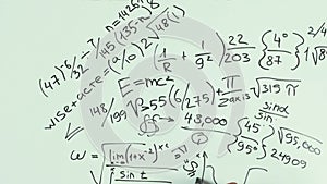 Man write bunch of mathematical formulas using black marker pen on whiteboard