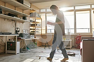 Man write song in notebook while go at sunny home