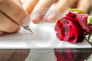 Man writing a letter to his sweetheart