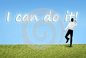 Man writing on sky I can do it word