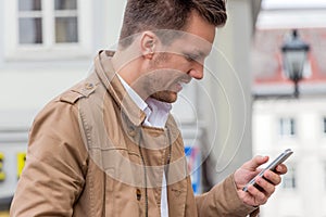 Man writing sms