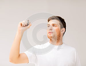 Man writing something in the air