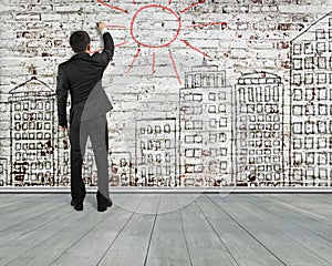 Man writing sun for building doodles old bricks wall , illustration