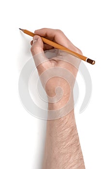Man's hand holding a pencil on white background photo