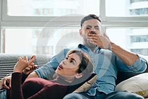 Man Yawning During Boring Conversation With Partner