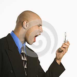 Man yelling at cellphone.