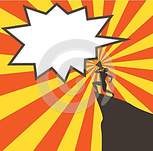 Man yelling in a megaphone on a rock