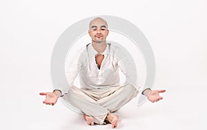 Man in yoga position.