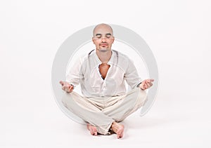 Man in yoga position.