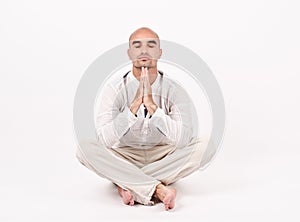 Man in yoga position.
