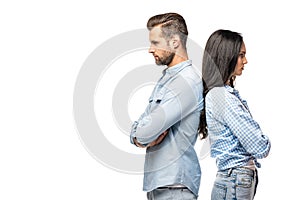 Man and young woman standing back to back with crossed arms Isolated On White