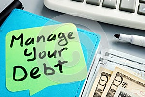 Manage your debt sign. Book and cash