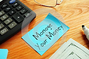 Manage Your Money is shown on the conceptual business photo