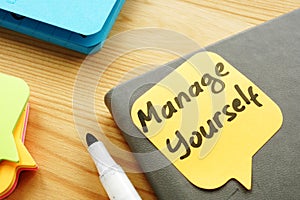 Manage yourself quote on a piece of paper. Self Leadership