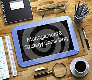 Management and Strategy Consulting - Text on Small Chalkboard. 3D.