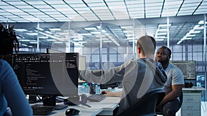 Manager admonishing programmer after making error in data center