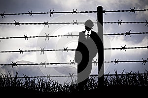 Manager behind Barbed wire