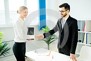 Manager and candidate shaking hands