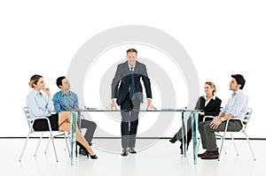 Manager With Colleague In Business Meeting