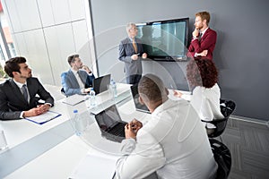 Manager with employer discus in company