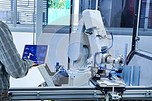Manager engineer check control automation Robotic arms, industrial robots factory automation machines