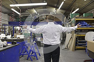 Manager on factory floor