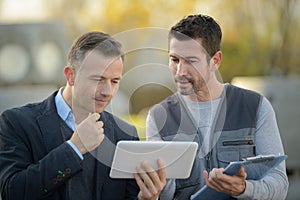 Manager factory showing tablet to worker