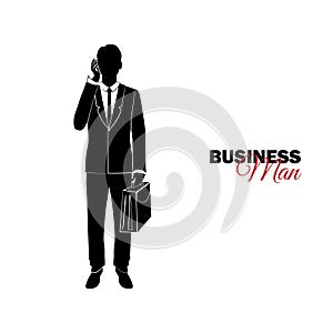 Manager. A man in a business suit. Businessman speaks by phone