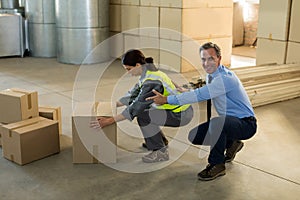 Manager motivating female worker while working