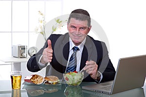 Manager at office eat green salad