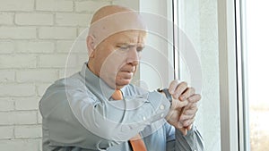 Manager in Office Stay and Wait Looking to Hand Watch Checking Time