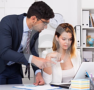 Manager scolding frustrated female