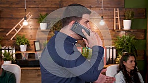 Manager sitting at desk table talking with remote entrepreneur discussing financial project