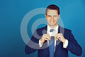 Manager smiling with bank or business card