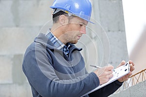 manager or supervisor with tablet outdoors