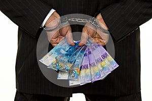 Manager with Swiss franc banknotes