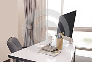 Manager Table with Desktop Computer and Business Notes
