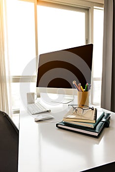 Manager Table with Desktop Computer and Business Notes